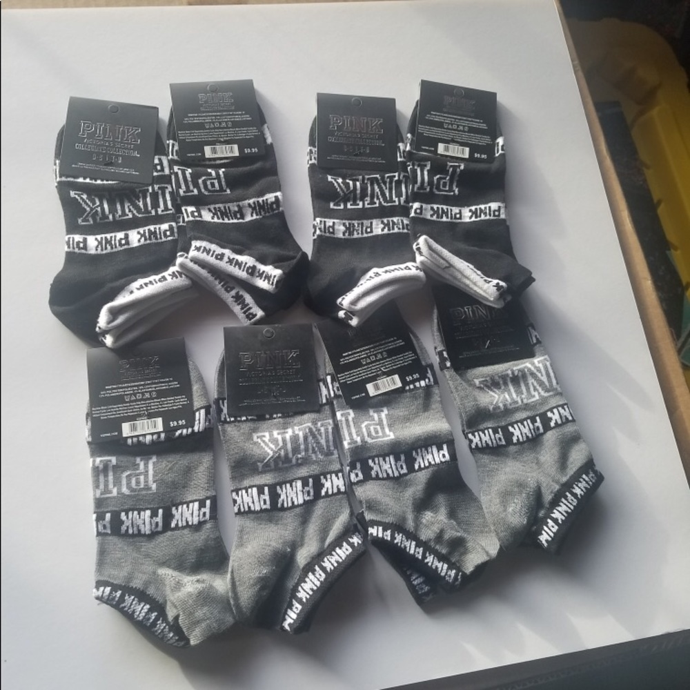 Sold Vs pink socks